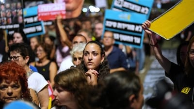 People listen to speeches as they take part in a rally demanding the returning of the bodies of hostages kidnapped by Hamas who are still in Gaza Strip, at a plaza known as hostages square, in Tel Aviv, Israel, (AP) People listen to speeches as they take part in a rally demanding the returning of the bodies of hostages kidnapped by Hamas who are still in Gaza Strip, at a plaza known as hostages square, in Tel Aviv, Israel, (AP)