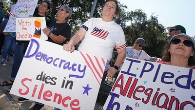 Participants show disapproval at a No Kings protest along Business 83 near Bentsen Tower in McAllen, Texas, Saturday, Oct. 18, 2025. (Joel Martinez/The Monitor via AP) (AP) Participants show disapproval at a No Kings protest along Business 83 near Bentsen Tower in McAllen, Texas, Saturday, Oct. 18, 2025. (Joel Martinez/The Monitor via AP) (AP)
