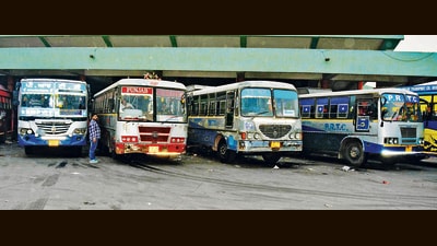 The workers noted that the state transport department is preparing to open tenders for kilometre scheme buses under Punjab Roadways on October 23. (HT Photo) The workers noted that the state transport department is preparing to open tenders for kilometre scheme buses under Punjab Roadways on October 23. (HT Photo)