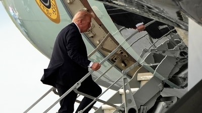 President Donald Trump boards Air Force One, Sunday, Oct. 19, 2025, at Palm Beach International Airport in West Palm Beach, Fla. (AP) President Donald Trump boards Air Force One, Sunday, Oct. 19, 2025, at Palm Beach International Airport in West Palm Beach, Fla. (AP)