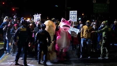 Anti-I.C.E. protesters clash with federal agents at the U.S. Immigration and Customs Enforcement building on October 18, 2025 in Portland, Oregon. Organizers expect millions to participate in cities and towns across the nation for the second "No Kings" protest to denounce the Trump administration. Mathieu Lewis-Rolland/Getty Images/AFP (Photo by Mathieu Lewis-Rolland / GETTY IMAGES NORTH AMERICA / Getty Images via AFP) (Getty Images via AFP) Anti-I.C.E. protesters clash with federal agents at the U.S. Immigration and Customs Enforcement building on October 18, 2025 in Portland, Oregon. Organizers expect millions to participate in cities and towns across the nation for the second "No Kings" protest to denounce the Trump administration. Mathieu Lewis-Rolland/Getty Images/AFP (Photo by Mathieu Lewis-Rolland / GETTY IMAGES NORTH AMERICA / Getty Images via AFP) (Getty Images via AFP)