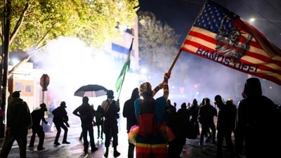 Numerous other Oregon cities, including Newport, Grants Pass, and Lake Oswego, also saw protests. (Getty Images via AFP) Numerous other Oregon cities, including Newport, Grants Pass, and Lake Oswego, also saw protests. (Getty Images via AFP)