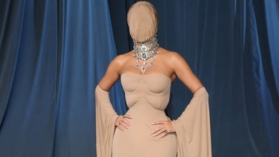 Kim Kardashian served a dramatic moment at the Academy Museum Gala in a nude dress and with her entire face covered.&nbsp; (REUTERS)