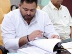  Leader of Opposition in Bihar Assembly and RJD leader Tejashwi Yadav filling his nomination paper from Raghopur constituency for the upcoming Bihar assembly elections 2025 with RJD Chief Lalu Prasad in Hajipur, Bihar, India, Wednesday,15, 2025
