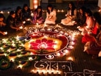 Guwahati, Oct 20 (ANI): Students of Cotton University make rangoli on the occasion of Diwali, in Guwahati on Monday. (ANI Photo) Guwahati, Oct 20 (ANI): Students of Cotton University make rangoli on the occasion of Diwali, in Guwahati on Monday. (ANI Photo)