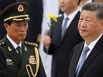 File photo of Central Military Commission Vice Chairman He Weidong walks by Chinese President Xi Jinping. 