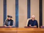Pakistani Defence Minister Khawaja Asif, center right, and Afghan Defence Minister Mullah Muhammad Yaqoob sign a ceasefire agreement in Doha, Qatar, Sunday, October 19, 2025. Pakistani Defence Minister Khawaja Asif, center right, and Afghan Defence Minister Mullah Muhammad Yaqoob sign a ceasefire agreement in Doha, Qatar, Sunday, October 19, 2025.