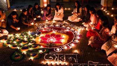 Guwahati, Oct 20 (ANI): Students of Cotton University make rangoli on the occasion of Diwali, in Guwahati on Monday. (ANI Photo) (Pitamber Newar) Guwahati, Oct 20 (ANI): Students of Cotton University make rangoli on the occasion of Diwali, in Guwahati on Monday. (ANI Photo) (Pitamber Newar)