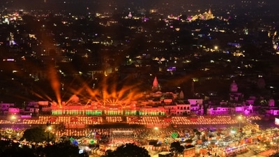 About 2.61 million oil lamps are lit along the Saryu river during Deepotsav celebrations on the eve of Diwali. (Rajesh Kumar Singh/AP)