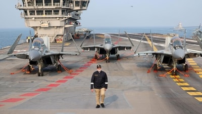 PM Modi sets foot on INS Vikrant as before saluting the armed forces and expressing joy on celebrating Diwali with them. “Today, on one side I have infinite horizons, infinite sky, and on the other side I have this giant, INS Vikrant, embodying infinite powers. The glow of the sun's rays on the ocean's waters is like the Diwali lamps lit by brave soldiers,” the Prime Minister said. (Sourced) PM Modi sets foot on INS Vikrant as before saluting the armed forces and expressing joy on celebrating Diwali with them. “Today, on one side I have infinite horizons, infinite sky, and on the other side I have this giant, INS Vikrant, embodying infinite powers. The glow of the sun's rays on the ocean's waters is like the Diwali lamps lit by brave soldiers,” the Prime Minister said. (Sourced)