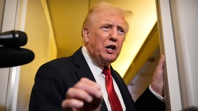 President Donald Trump speaks to reporters aboard Air Force One. (AP) President Donald Trump speaks to reporters aboard Air Force One. (AP)