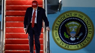 President Donald Trump walks down the stairs of Air Force One upon his arrival at Joint Base Andrews. (AP)