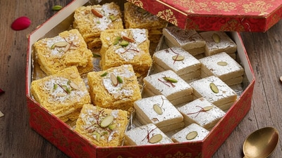 If you have mithai boxes like this, think twice before you scarf down their contents. (Picture credit: Gemini AI ) If you have mithai boxes like this, think twice before you scarf down their contents. (Picture credit: Gemini AI )