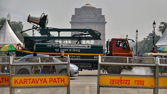 Smog Gun spray water to control pollution level as Air Quality dropped to poor category, in New Delhi on Friday. (ANI Photo)(Vipin Kumar)