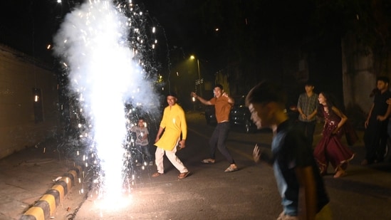 New Delhi, India - Oct. 19, 2025:Children celebrates Small Diwali at near Mandi House in New Delhi, India, on Sunday, October 19, 2025. (Photo by Arvind Yadav/ Hindustan Times)(Hindustan Times)