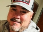 While Billy Joe Cagle was unarmed at the time of his arrest, investigators discovered a “AR-15 assault rifle” in his parked car.