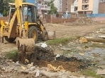Devotees said debris and stagnant water have made ghats unfit for rituals; MCG says cleaning will be completed before October 25. (HT Photo)