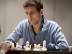 This undated photo released by Charlotte Chess Center shows Daniel Naroditsky playing chess on the board. This undated photo released by Charlotte Chess Center shows Daniel Naroditsky playing chess on the board.