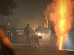 People burst crackers to celebrate Diwali Festival at Patel Nagar in New Delhi, India, on Monday, October 20, 2025. (Photo by Sanchit Khanna/ Hindustan Times) People burst crackers to celebrate Diwali Festival at Patel Nagar in New Delhi, India, on Monday, October 20, 2025. (Photo by Sanchit Khanna/ Hindustan Times)