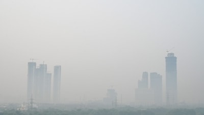 Thick smog blankets Noida skyline, buildings barely visible on Tuesday morning (Photo by Sunil Ghosh. HT) Thick smog blankets Noida skyline, buildings barely visible on Tuesday morning (Photo by Sunil Ghosh. HT)
