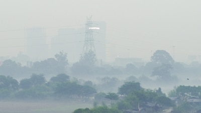 New Delhi, Oct 21 (ANI): Thick layer of smog engulfs the national capital, reducing visibility and worsening air quality across New Delhi, on Tuesday.( ANI photo/ Atul Kumar yadav) (Atul Kumar Yadav) New Delhi, Oct 21 (ANI): Thick layer of smog engulfs the national capital, reducing visibility and worsening air quality across New Delhi, on Tuesday.( ANI photo/ Atul Kumar yadav) (Atul Kumar Yadav)