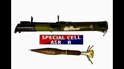 Apart from recovering the RPG and its launcher, police teams also impounded their motorcycle, which they were riding. (HT) Apart from recovering the RPG and its launcher, police teams also impounded their motorcycle, which they were riding. (HT)