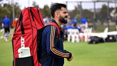 India's Virat Kohli walks from the nets after a practice session (AFP)