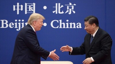 File photo of China's President Xi Jinping with US President Donald Trump. (AFP) File photo of China's President Xi Jinping with US President Donald Trump. (AFP)