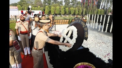 Gaurav Yadav, director general of police (DGP), Punjab, paid tributes to the bravehearts on the 66th state-level Police Commemoration Day at the Punjab Armed Police (PAP) Headquarters in Jalandhar on Tuesday. (HT Photo)