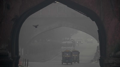 Gram it: Commuters drove amid heavy smog in Delhi on Tuesday morning, as haze engulfed the city skyline a day after Diwali celebrations. You too feel the urge to cough or sneeze? (Photo: Arun Sankar/AFP)