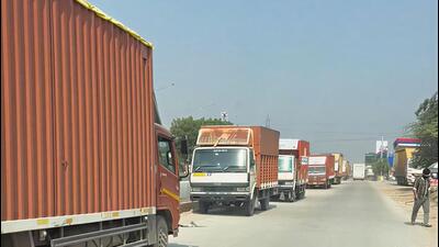 Locals blame NHAI for inaction as trucks, workshops, and flyover work narrow the road, causing long delays and raising safety concerns. (HT Archive) Locals blame NHAI for inaction as trucks, workshops, and flyover work narrow the road, causing long delays and raising safety concerns. (HT Archive)