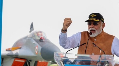 Prime Minister Narendra Modi at Adampur air base with MiG-29 fighter in the backdrop. Prime Minister Narendra Modi at Adampur air base with MiG-29 fighter in the backdrop.