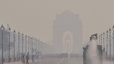 An anti-smog gun sprays water droplets to curb air pollution in New Delhi (PTI) An anti-smog gun sprays water droplets to curb air pollution in New Delhi (PTI)