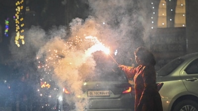 People burst crackers to celebrate Diwali Festival at Patel Nagar in New Delhi. (Hindustan Times) People burst crackers to celebrate Diwali Festival at Patel Nagar in New Delhi. (Hindustan Times)