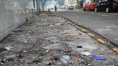 Remnants of firecrackers strewn on road. (Arvind Yadav/HT)