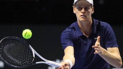 Italy's Jannik Sinner returns the ball to Greece's Stefanos Tsitsipas during the quarter-final of the Six Kings Slam exhibition tennis tournament in Riyadh (AFP) Italy's Jannik Sinner returns the ball to Greece's Stefanos Tsitsipas during the quarter-final of the Six Kings Slam exhibition tennis tournament in Riyadh (AFP)