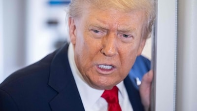 US President Donald Trump speaks with the media aboard Air Force One. (AFP) US President Donald Trump speaks with the media aboard Air Force One. (AFP)