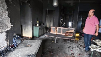 The fire was likely caused by a short circuit on the tenth floor and spread rapidly to the 11th and 12th floors, engulfing six flats, officials said. (Bachchan Kumar/ HT PHOTO) The fire was likely caused by a short circuit on the tenth floor and spread rapidly to the 11th and 12th floors, engulfing six flats, officials said. (Bachchan Kumar/ HT PHOTO)