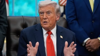 President Donald Trump answers questions from reporters during a Diwali celebration in the Oval Office at the White House, Tuesday, Oct. 21, 2025, in Washington. (AP) President Donald Trump answers questions from reporters during a Diwali celebration in the Oval Office at the White House, Tuesday, Oct. 21, 2025, in Washington. (AP)