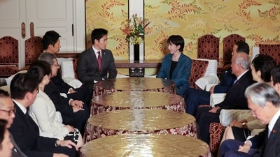 Leader of Japan's ruling Liberal Democratic Party (LDP) Sanae Takaichi and the Japan Innovation Party's, known as Ishin, leader Hirofumi Yoshimura meet at Japan's National Diet Building in Tokyo, Japan, October 20, 2025.
