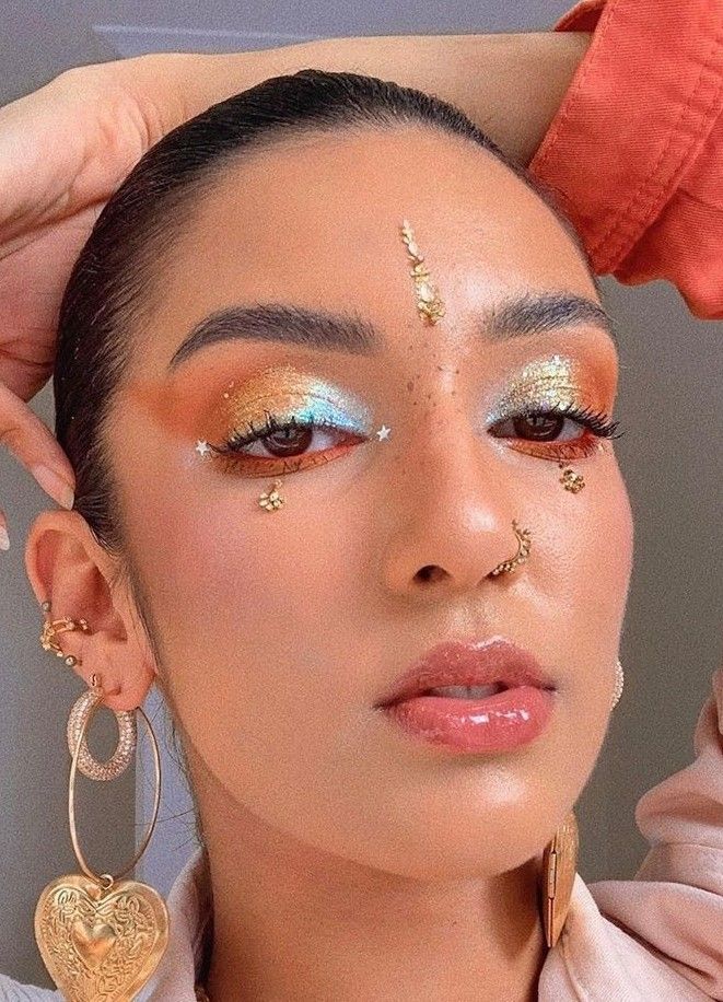 Influencer Rowi Singh sporting iridescent eye makeup.