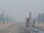 A smog gun sprays water to control pollution on Kartavaya Path in New Delhi on Wednesday as the air quality worsened. (ANI Photo) A smog gun sprays water to control pollution on Kartavaya Path in New Delhi on Wednesday as the air quality worsened. (ANI Photo)