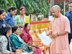 Chief minister Yogi Adityanath listens to the concerns of people during Janata Darshan at Gorakhnath Temple, in Gorakhpur on Wednesday. (@myogioffice/ANI Photo) Chief minister Yogi Adityanath listens to the concerns of people during Janata Darshan at Gorakhnath Temple, in Gorakhpur on Wednesday. (@myogioffice/ANI Photo)