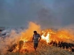 In Handesra, stubble was found burning on approximately one acre of farmland (HT File)