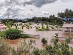 A view of partially submerged structures following heavy rainfall, in Uthamapalayam, Tamil Nadu. A view of partially submerged structures following heavy rainfall, in Uthamapalayam, Tamil Nadu.