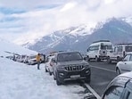 Tourists at Rohtang Pass near Manali after fresh snowfall on Wednesday. (HT photo)