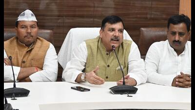 AAP MP Sanjay Singh (middle) addressing media persons in Prayagraj on Wednesday. (HT)