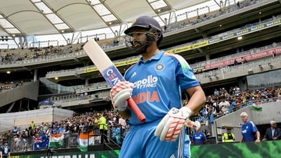 Rohit Sharma walks onto the field to open the innings in the first one-day international cricket match between Australia and India in Perth (AFP) Rohit Sharma walks onto the field to open the innings in the first one-day international cricket match between Australia and India in Perth (AFP)