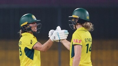 Australia's Annabel Sutherland and Ashleigh Gardner celebrate after winning the match (REUTERS)