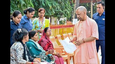Chief minister Yogi Adityanath listens to the concerns of people during Janata Darshan at Gorakhnath Temple, in Gorakhpur on Wednesday. (@myogioffice/ANI Photo) Chief minister Yogi Adityanath listens to the concerns of people during Janata Darshan at Gorakhnath Temple, in Gorakhpur on Wednesday. (@myogioffice/ANI Photo)